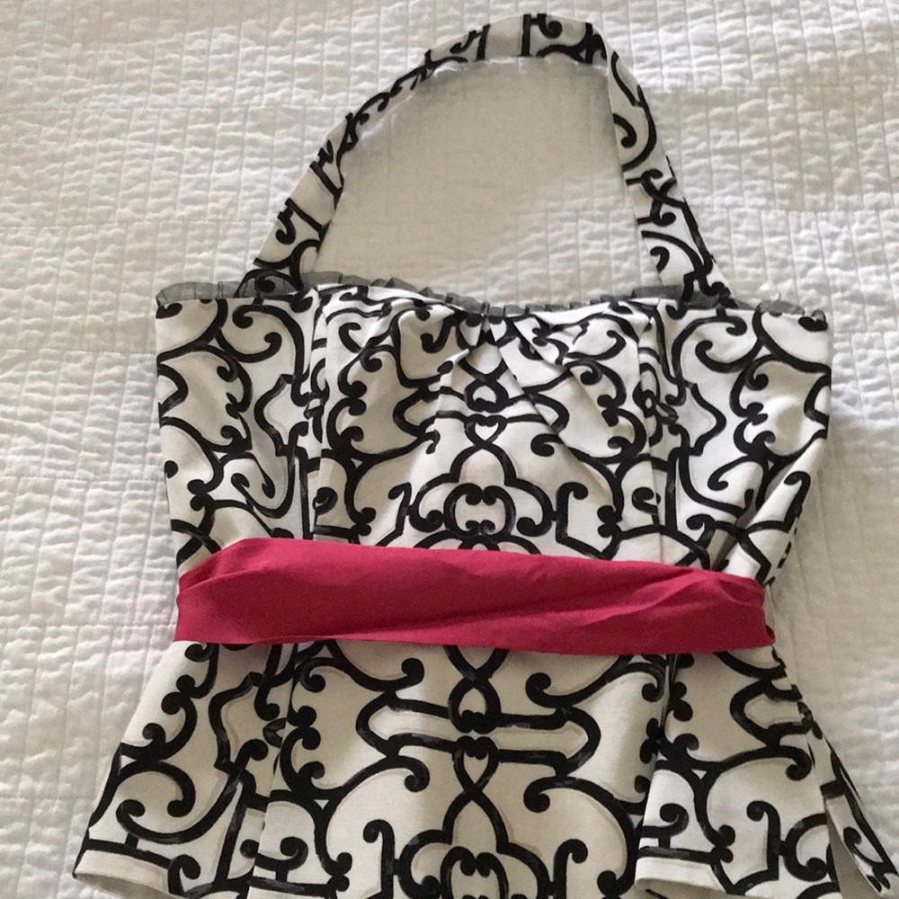 White and black market top size 6 black and white hot pink bow.
